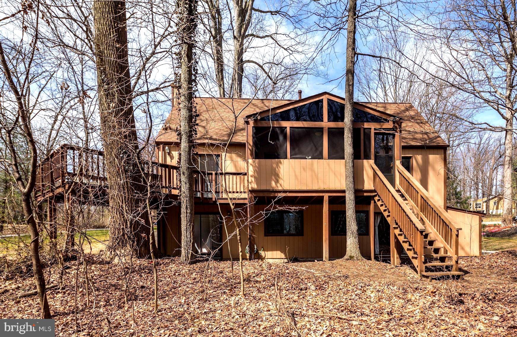 9510 Good Lion Road Columbia, MD 21045 - Photo 2 of 63 LARGE SCREENED IN PORCH W/OPEN AIR WRAP DECK