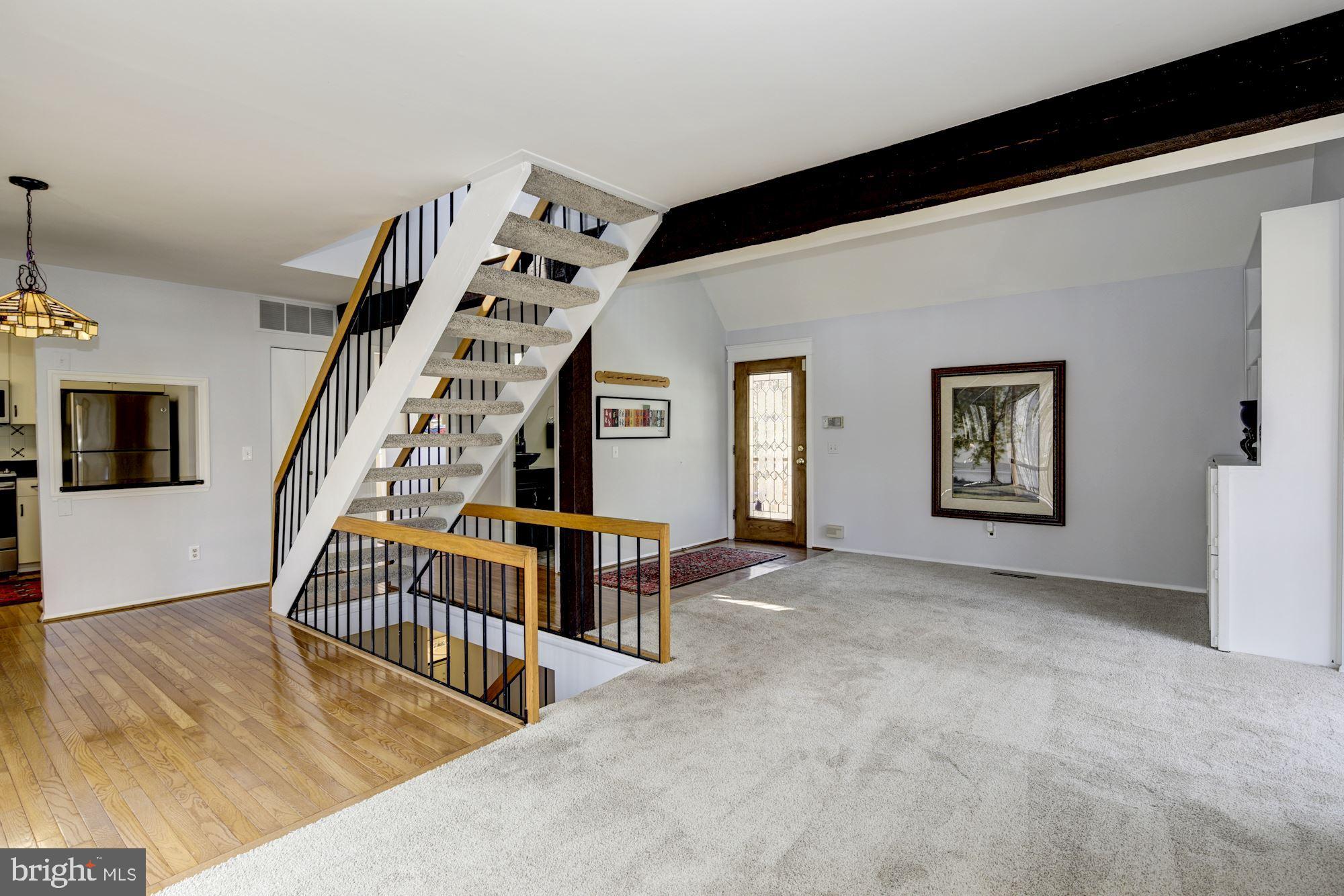 9510 Good Lion Road Columbia, MD 21045 - Photo 12 of 63 OFFSET STAIRCASES AND EXCITING ROOM AREAS