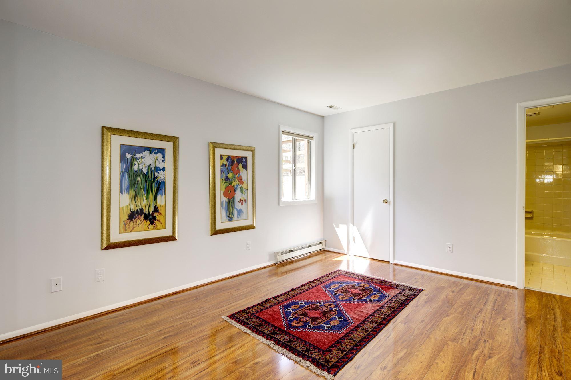 9510 Good Lion Road Columbia, MD 21045 - Photo 46 of 63 MASTER W. WIDE PLANKED ENGINEERED HARDWOOD