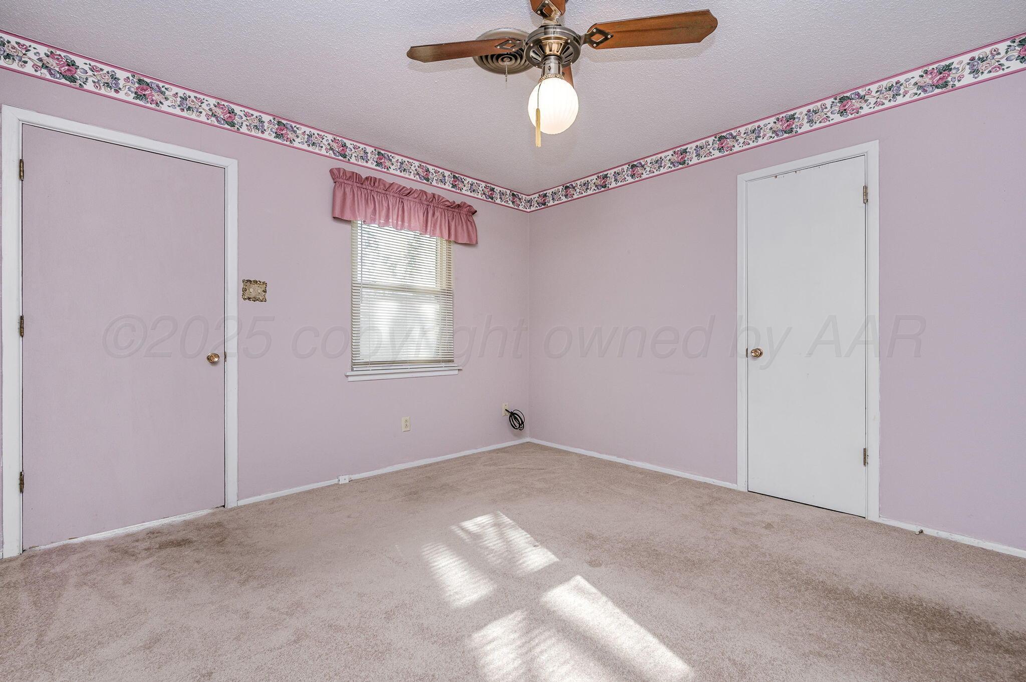 4701 Mesa Circle Amarillo, TX 79109 - Photo 18 of 20 a view of an empty room with a window