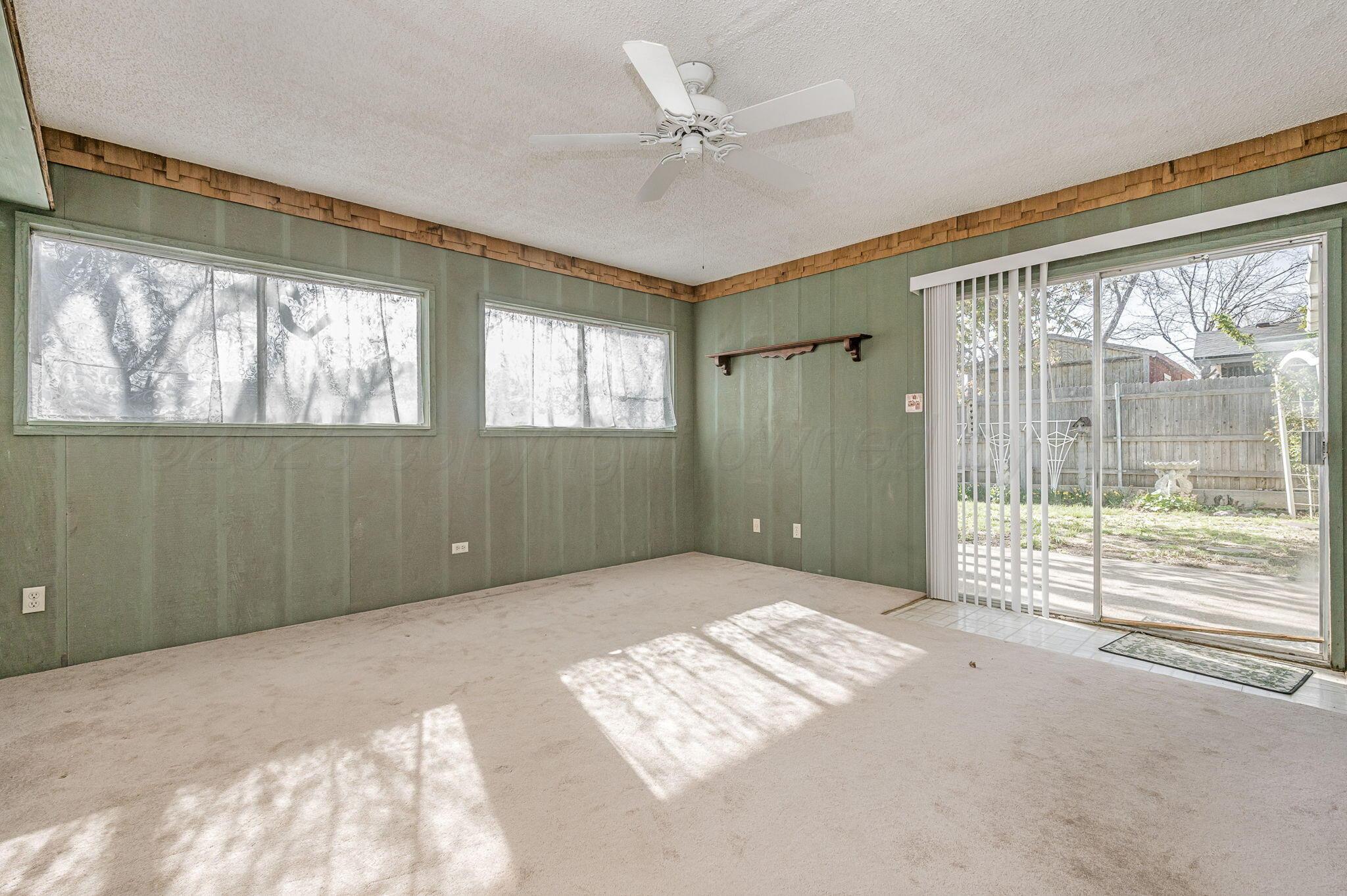 4701 Mesa Circle Amarillo, TX 79109 - Photo 10 of 20 a view of an empty room with a window