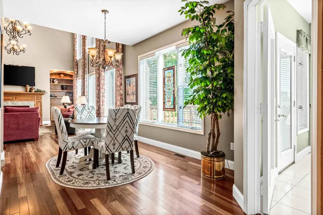 a living room with furniture fireplace and a flat screen tv