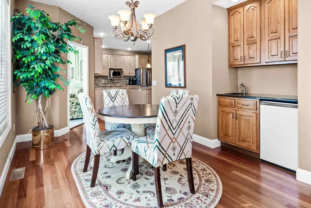 a bathroom with a sink vanity and mirror