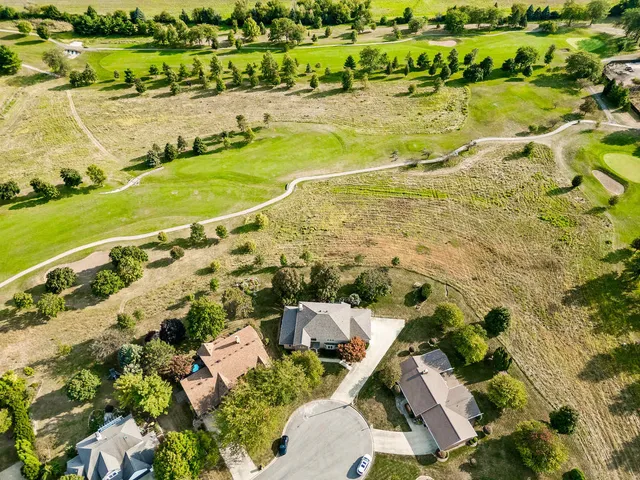 a front view of a house with a garage