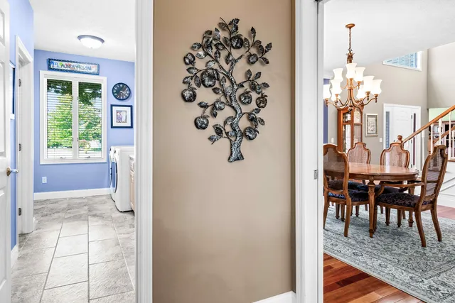 a view of a livingroom with furniture and a flat screen tv