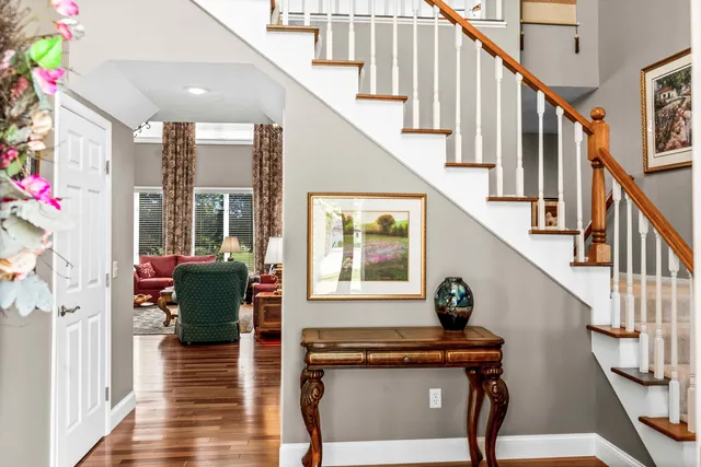 a kitchen with stainless steel appliances a sink stove and refrigerator