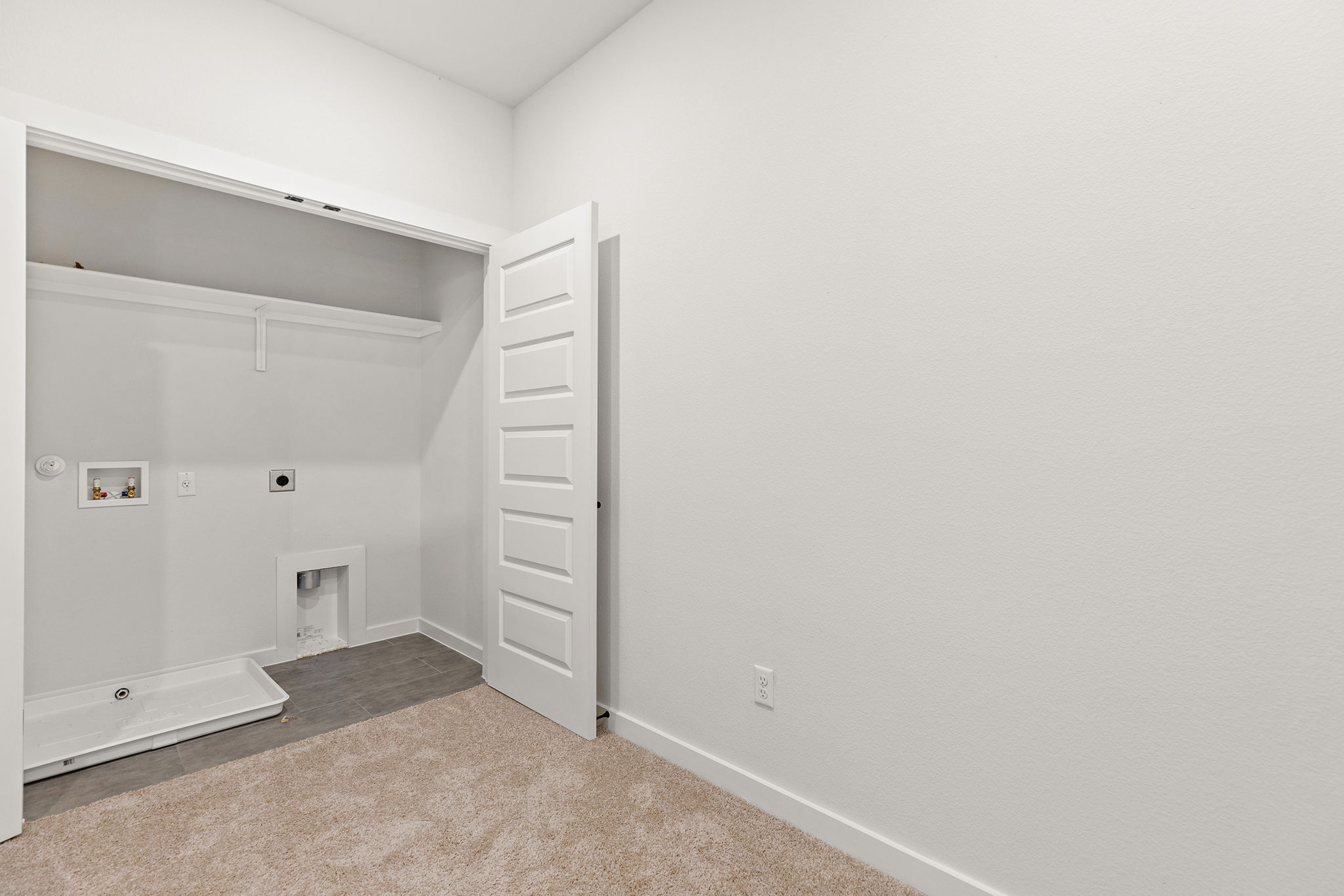 2600 Gattis School Road, Unit 1002 Round Rock, TX 78664 - Photo 15 of 40 A dedicated laundry closet offers convenient hookups for your washer and dryer, simplifying chores.