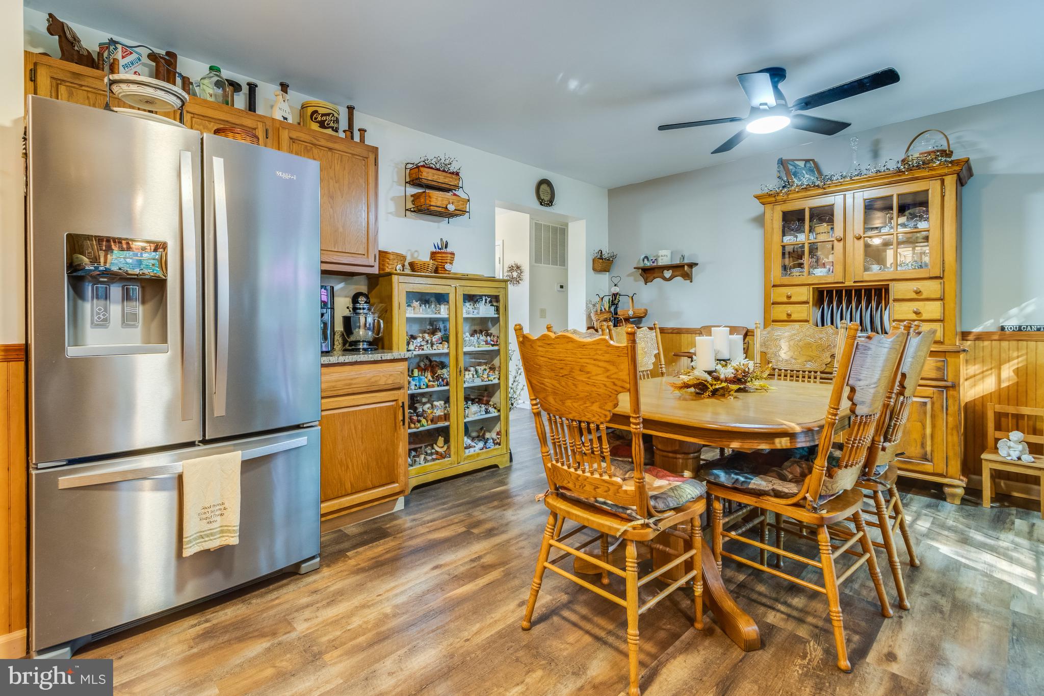 30064 West Mill Run Milton, DE 19968 - Photo 12 of 42 a view of a dining room with furniture window and wooden floor