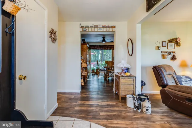 a view of living room and kitchen with furniture