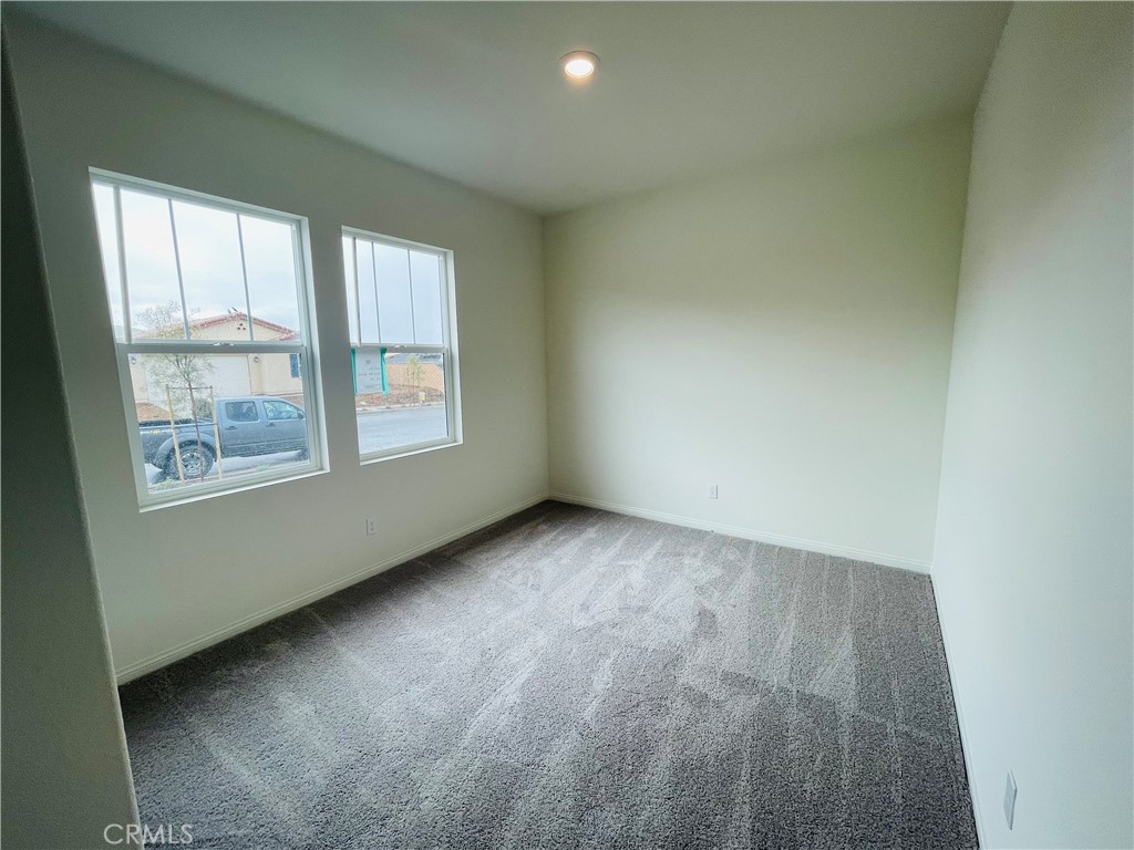 19770 Barnfield Place Riverside, CA 92507 - Photo 11 of 22 an empty room with windows