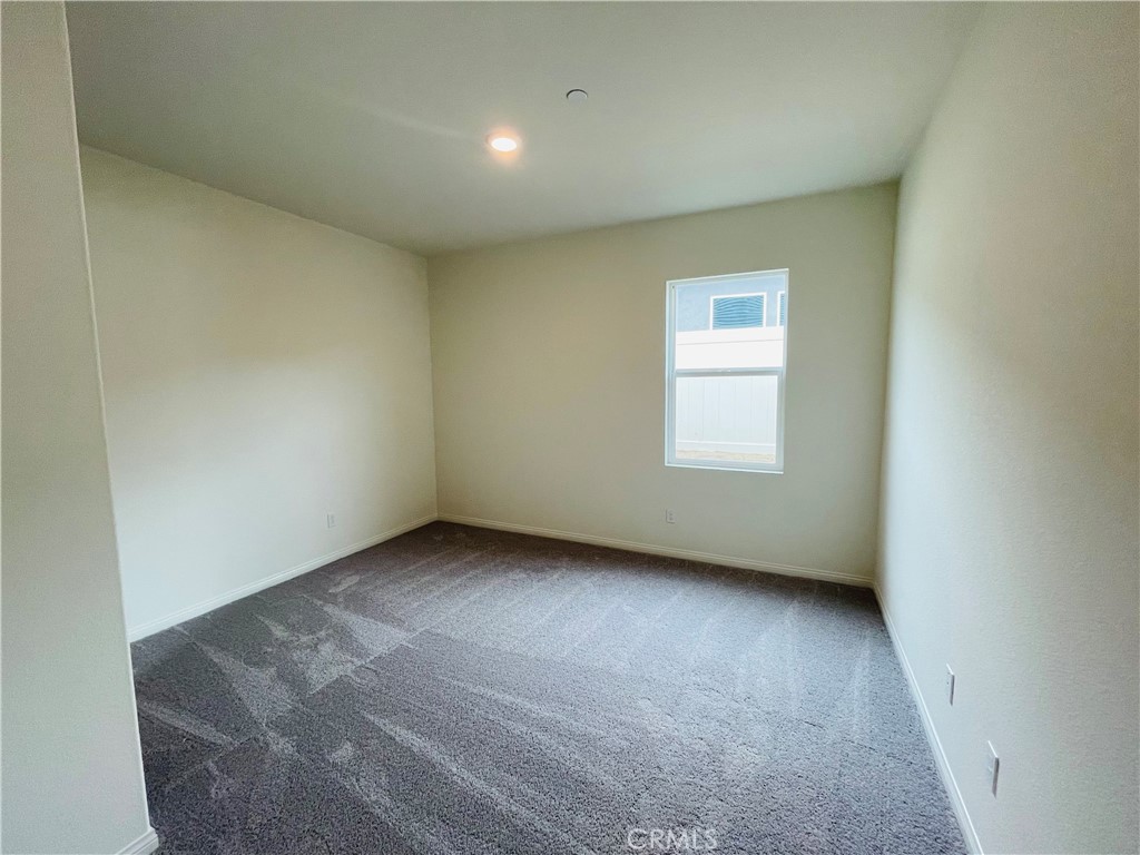 19770 Barnfield Place Riverside, CA 92507 - Photo 17 of 22 an empty room with a window