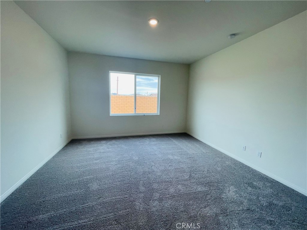 19770 Barnfield Place Riverside, CA 92507 - Photo 18 of 22 an empty room with a window