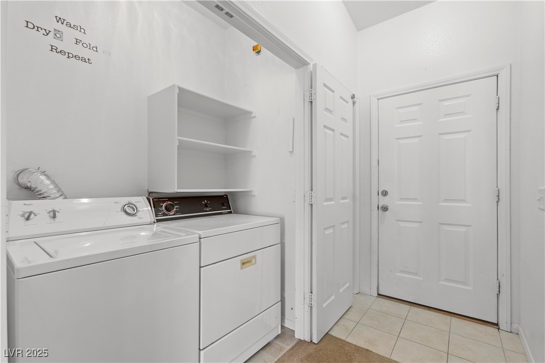 1430 Star Road Pahrump, NV 89048 - Photo 29 of 32 Laundry area featuring independent washer and dryer and light tile patterned floors