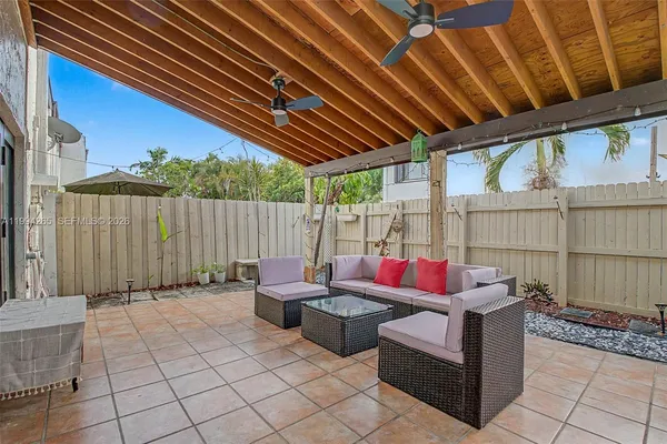 a outdoor space with patio lots of furniture