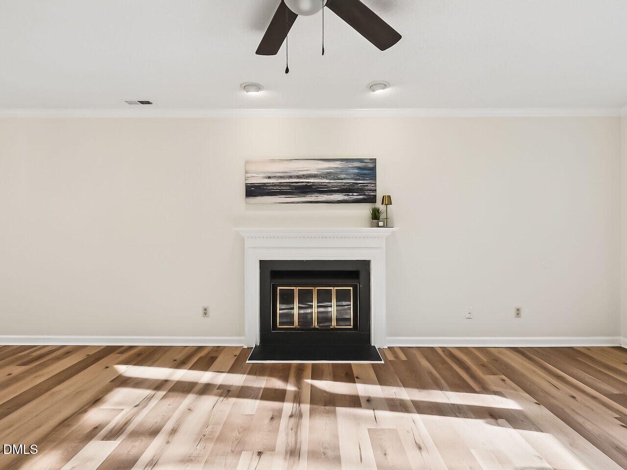 3204 Coachman's Way Durham, NC 27705 - Photo 4 of 27 a view of an empty room with window and fireplace