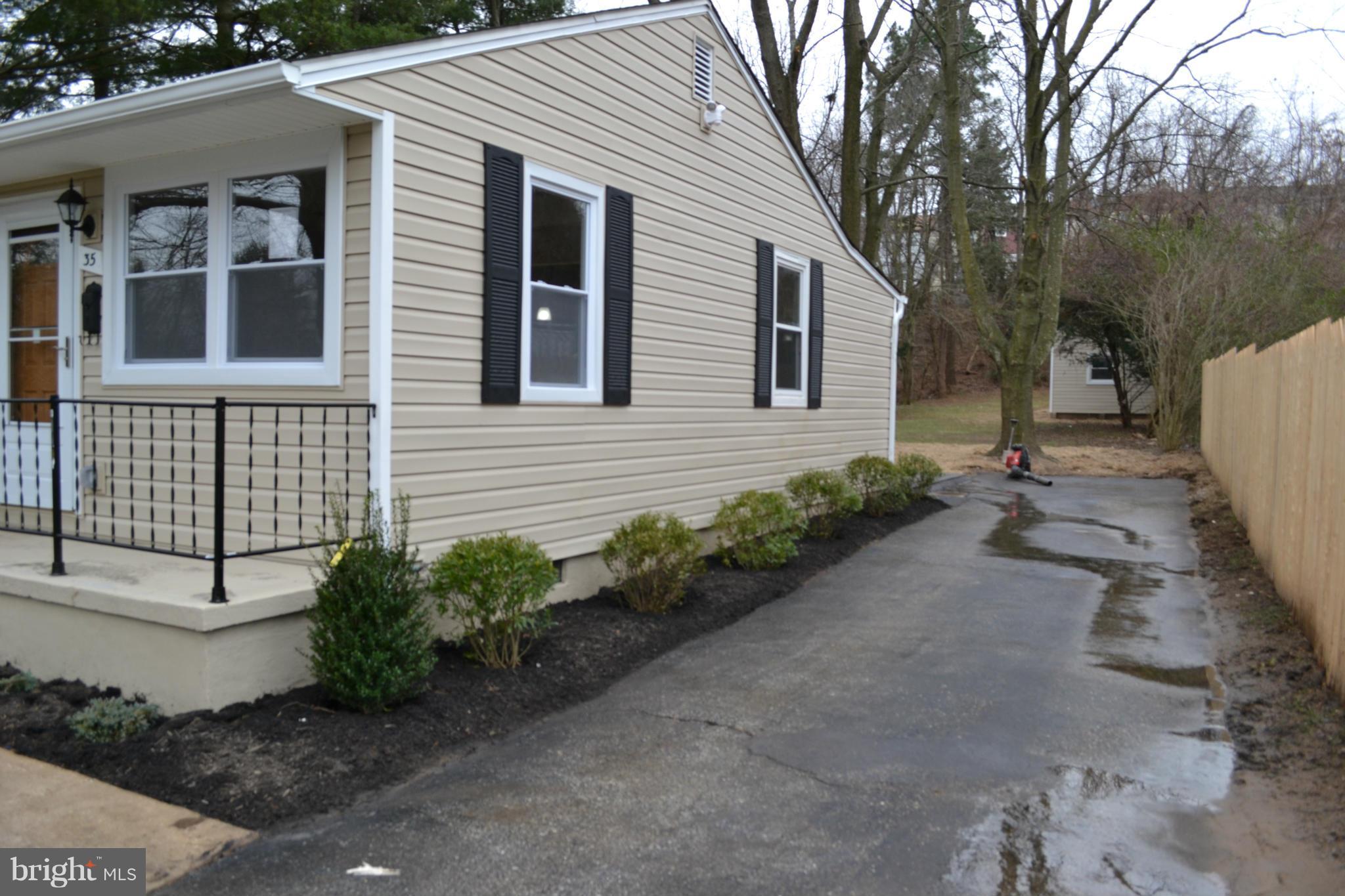 35 Ritters Lane Owings Mills, MD 21117 - Photo 3 of 26 Plenty of off street parking/ Partially Fenced