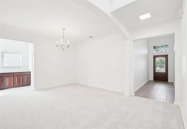 an empty room with fan