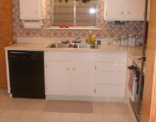 521 Olney Road Vinton, VA 24179 - Photo 4 of 5 a bathroom with a sink and a washing machine