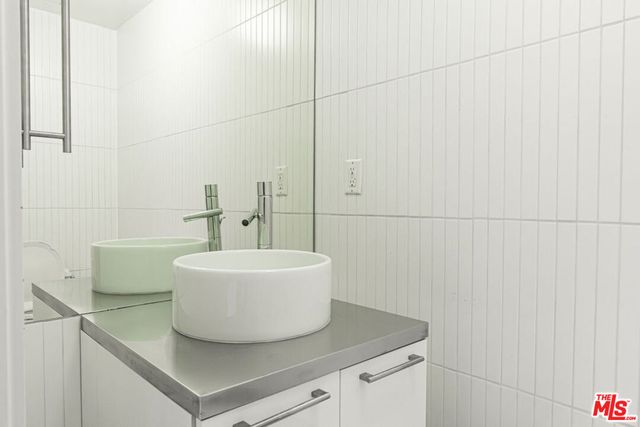 a bathroom with a sink and a bathtub