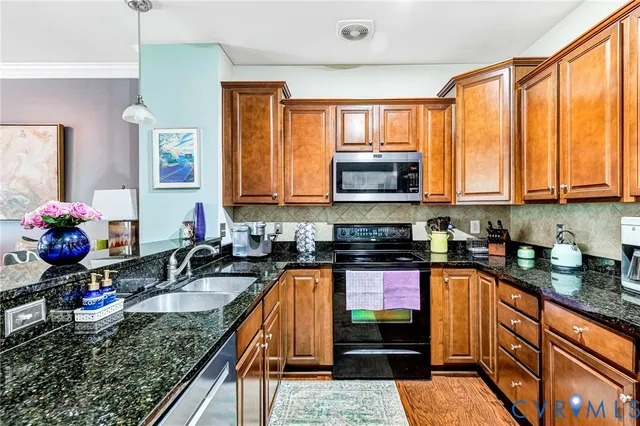 a kitchen with granite countertop lots of counter top space