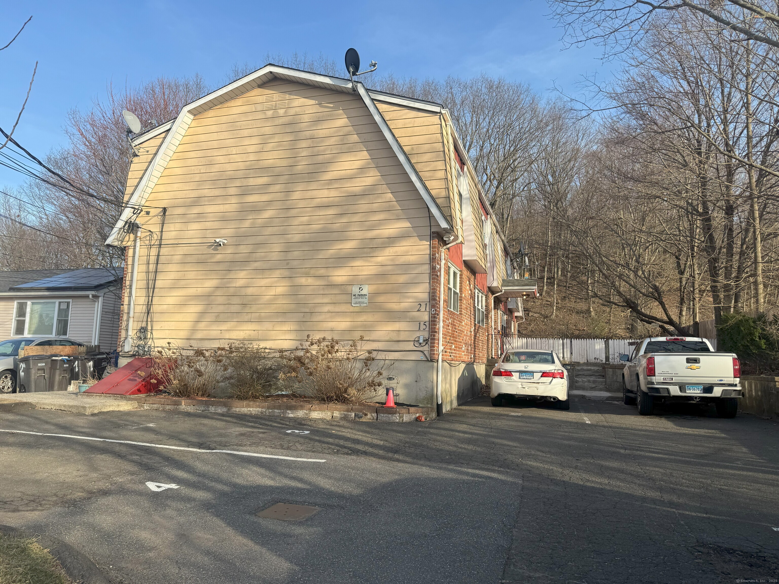 a view of a city street with tall buildings