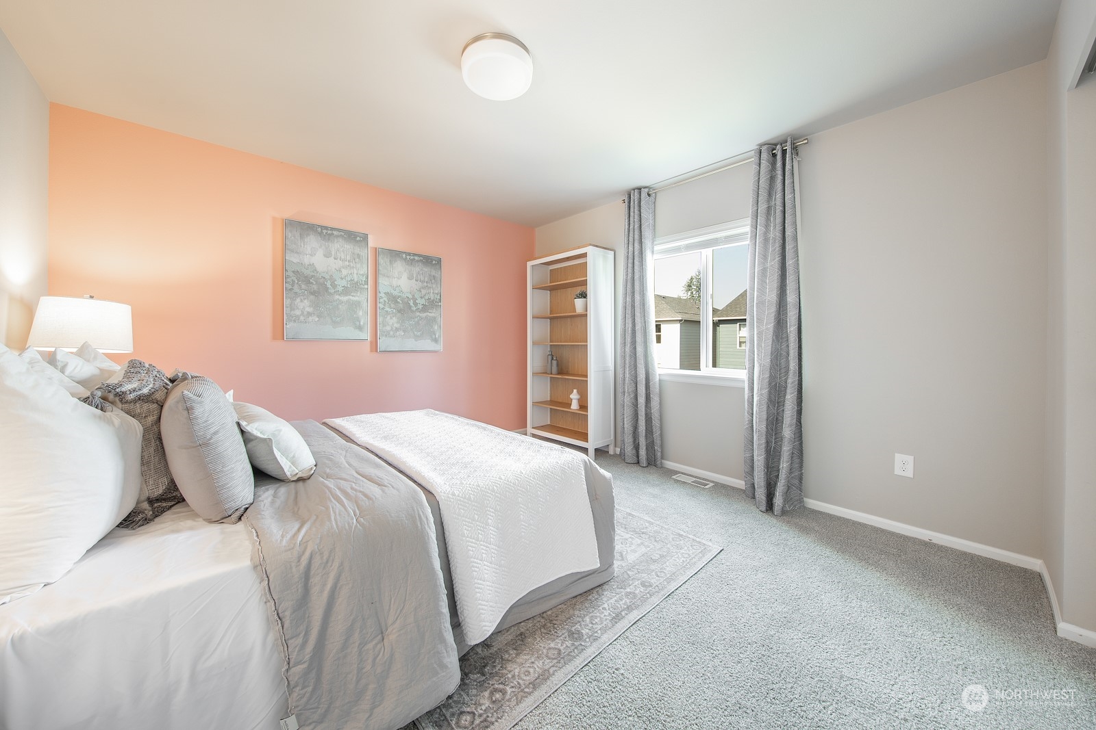 15 182nd Street Southeast Bothell, WA 98012 - Photo 23 of 32 a bedroom with a bed and a lamp