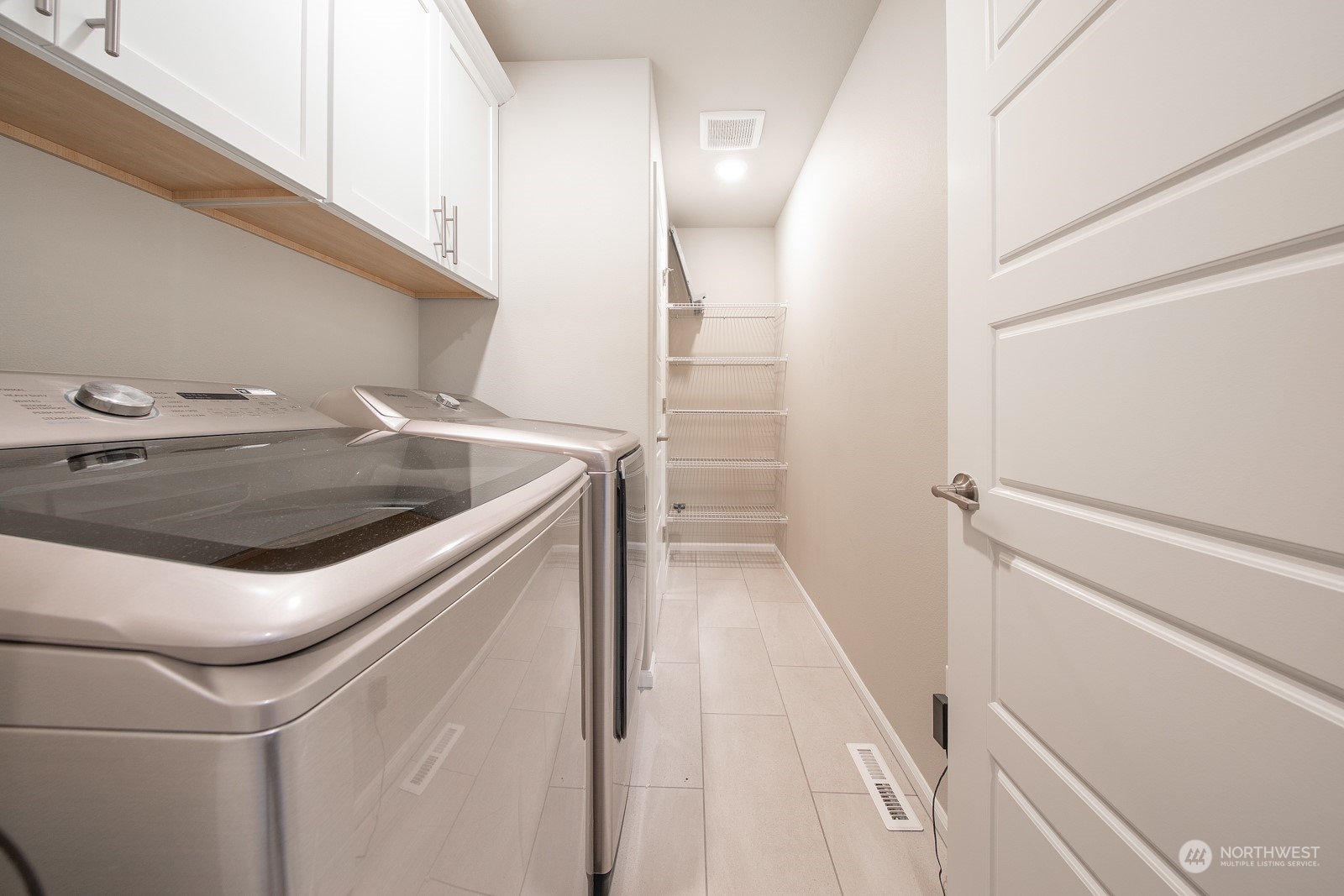 15 182nd Street Southeast Bothell, WA 98012 - Photo 27 of 32 a utility room with dryer and washer