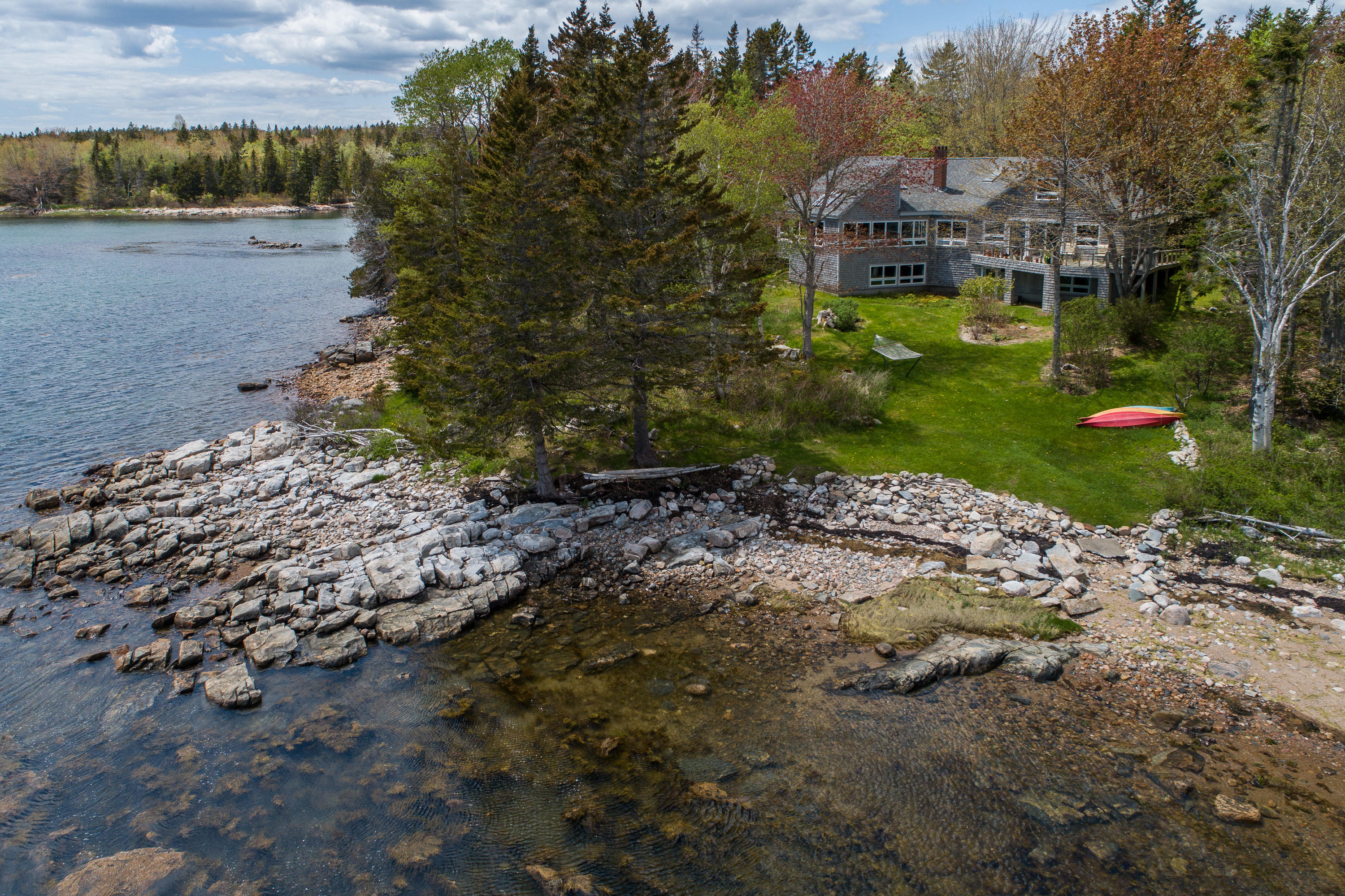 127 Paul Bunyan Road Corea, ME 04624 - Photo 37 of 46 View of house & land from water.