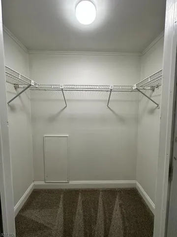 a view of a room with racks on the wall