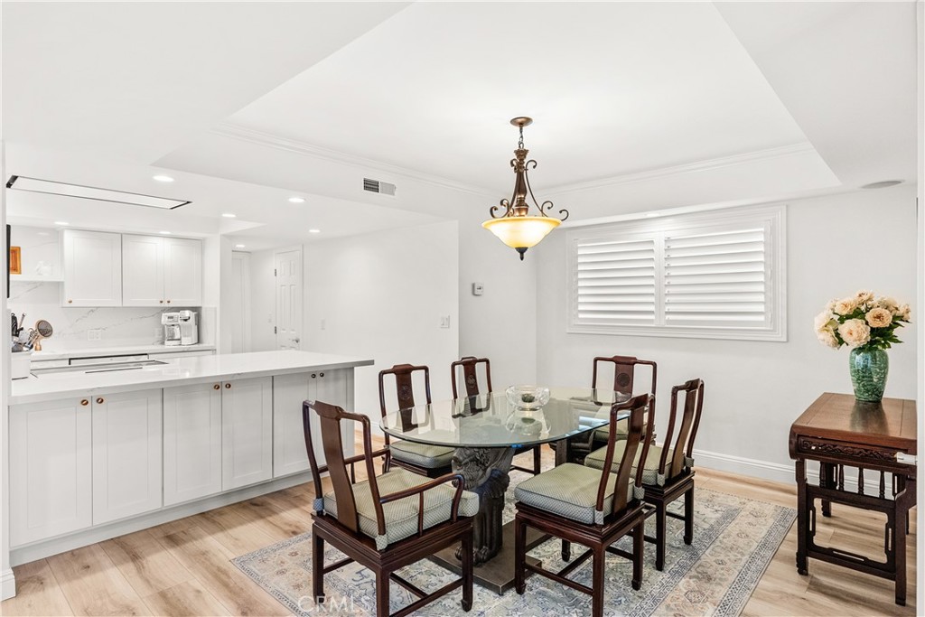 5 Canal Circle Newport Beach, CA 92663 - Photo 4 of 22 a view of a dining room with furniture and window