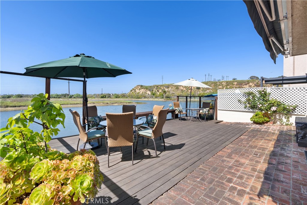 5 Canal Circle Newport Beach, CA 92663 - Photo 10 of 22 a view of a terrace with furniture