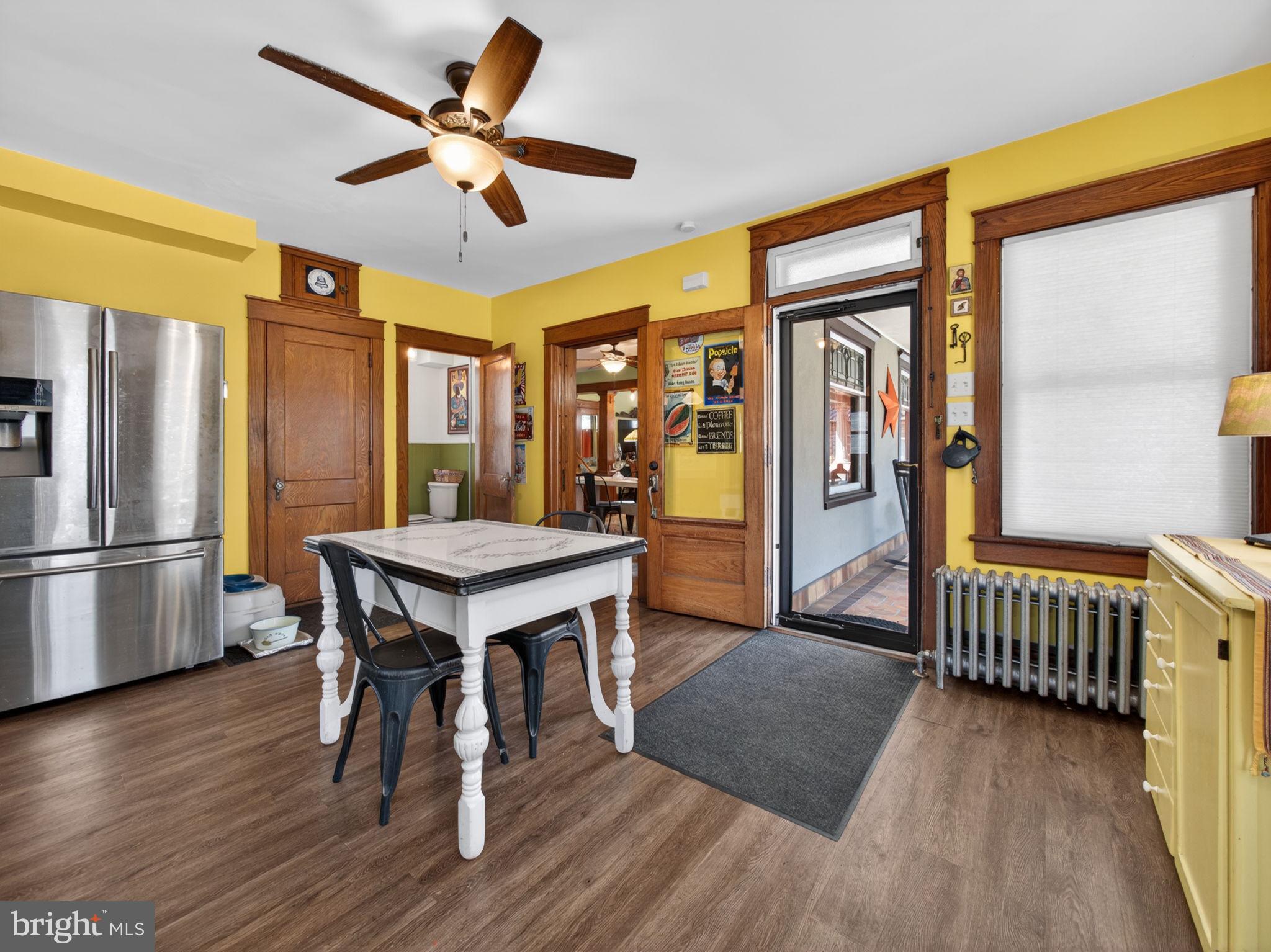 6220 Bake Oven Road Germansville, PA 18053 - Photo 28 of 59 a dining room with furniture a rug a flat screen tv and a chandelier