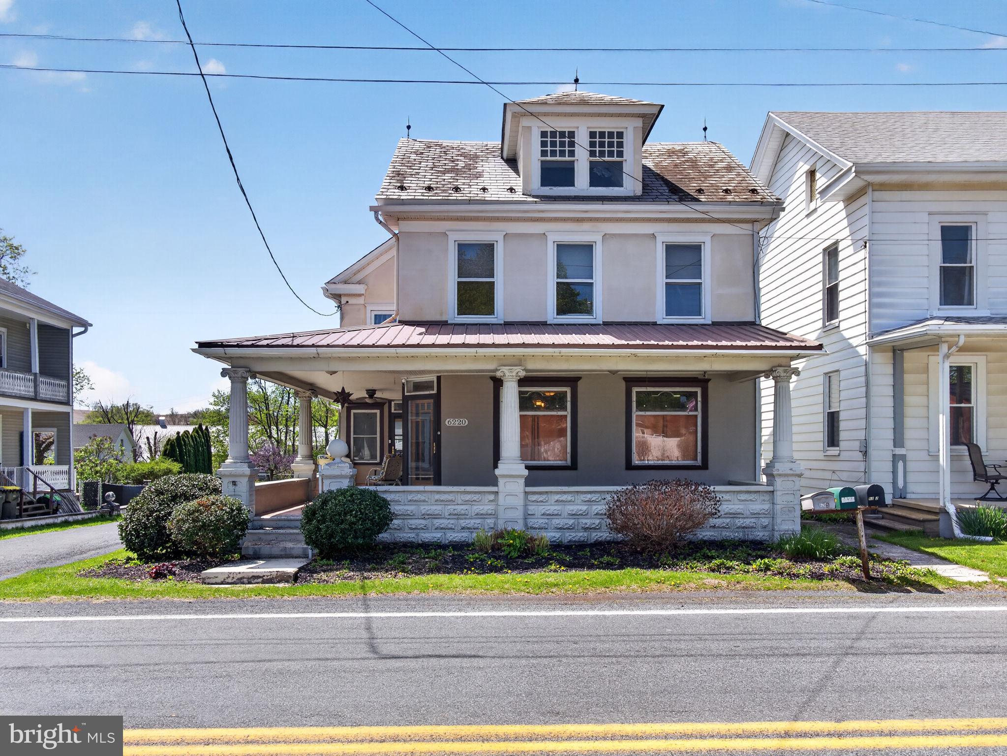 6220 Bake Oven Road Germansville, PA 18053 - Photo 4 of 59 a front view of a house with a yard and potted plants
