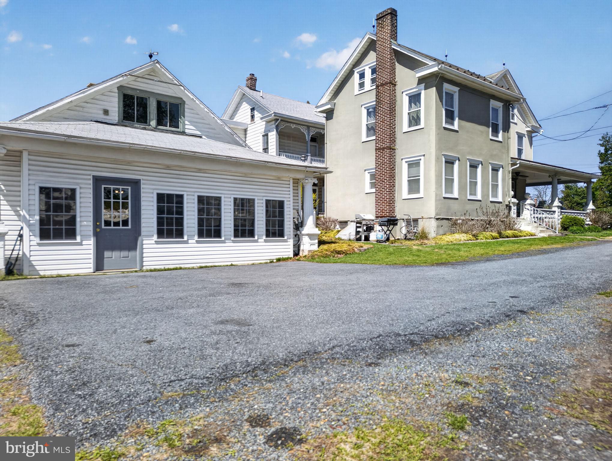 6220 Bake Oven Road Germansville, PA 18053 - Photo 7 of 59 a front view of a house with a porch and a yard