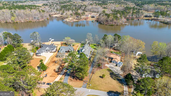 an aerial view of lake residential house with outdoor space