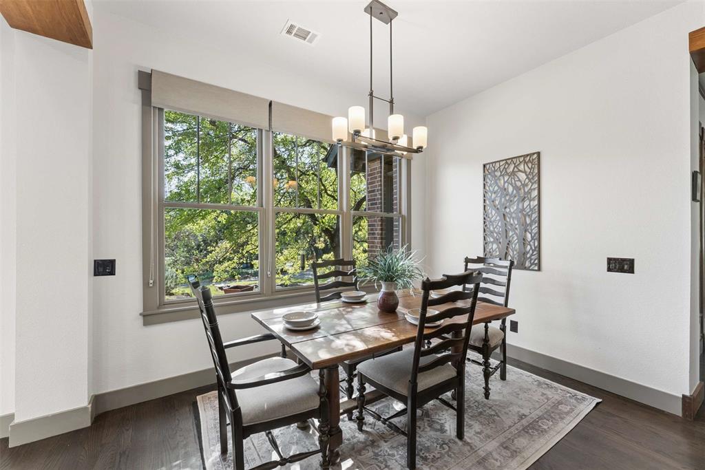 7430 Dawn Avenue Pilot Point, TX 76258 - Photo 11 of 39 a view of a dining room with furniture window and wooden floor