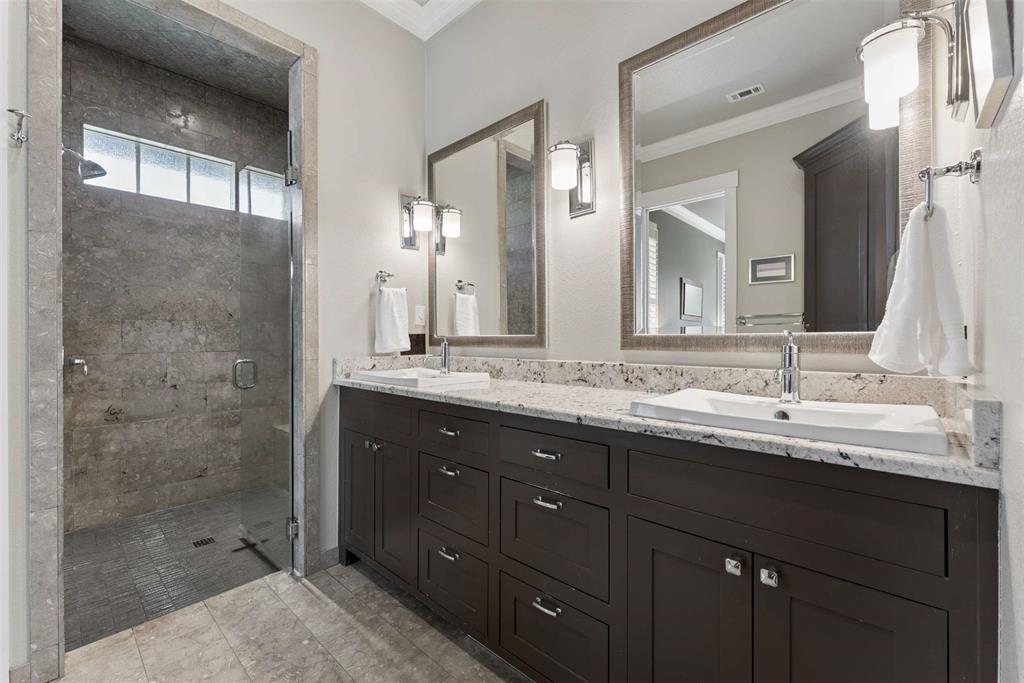 7430 Dawn Avenue Pilot Point, TX 76258 - Photo 16 of 39 a bathroom with a granite countertop sink mirror and double
