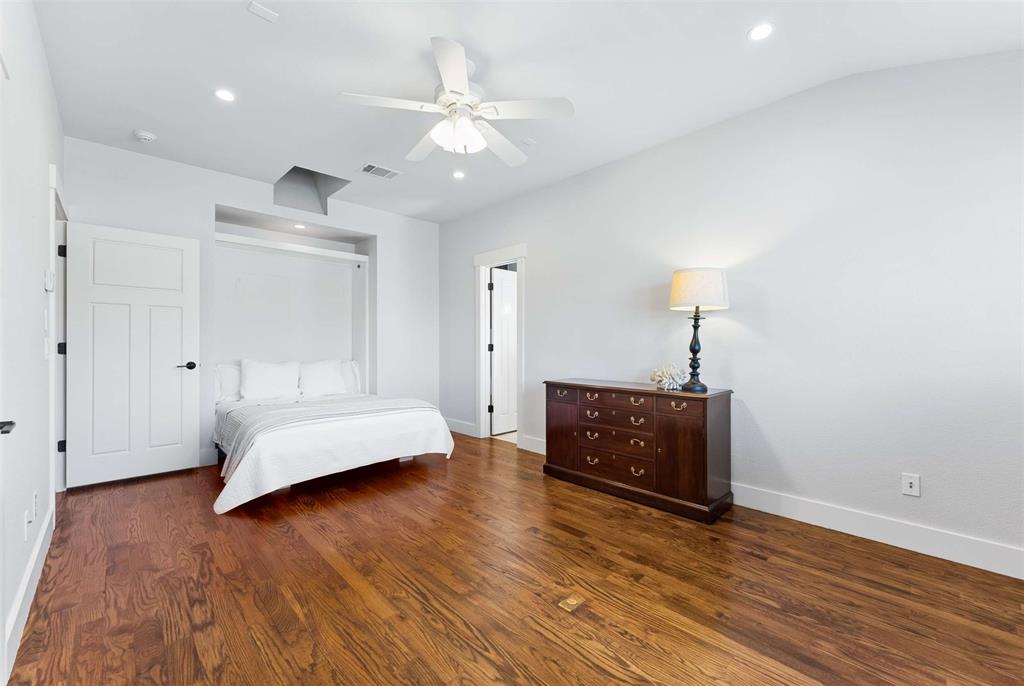 7430 Dawn Avenue Pilot Point, TX 76258 - Photo 21 of 39 a living room with furniture and a wooden floor