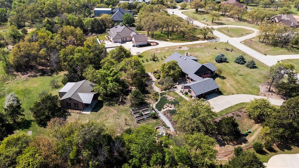 7430 Dawn Avenue Pilot Point, TX 76258 - Photo 3 of 39 an aerial view of residential house with outdoor space and swimming pool