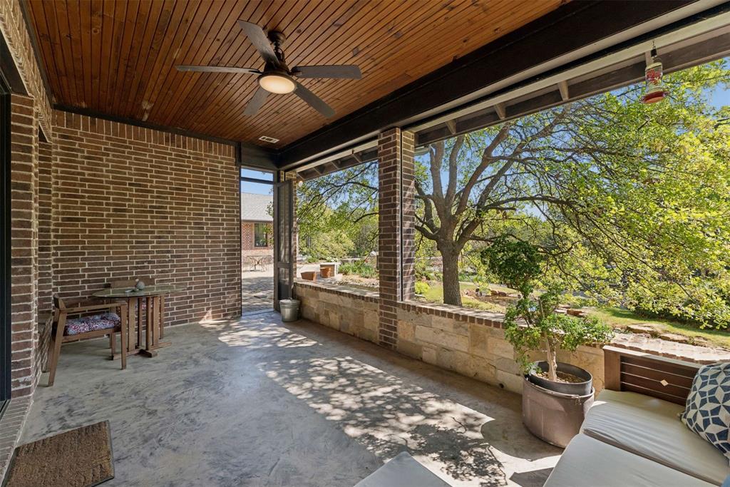 7430 Dawn Avenue Pilot Point, TX 76258 - Photo 32 of 39 a view of a porch with furniture and a yard