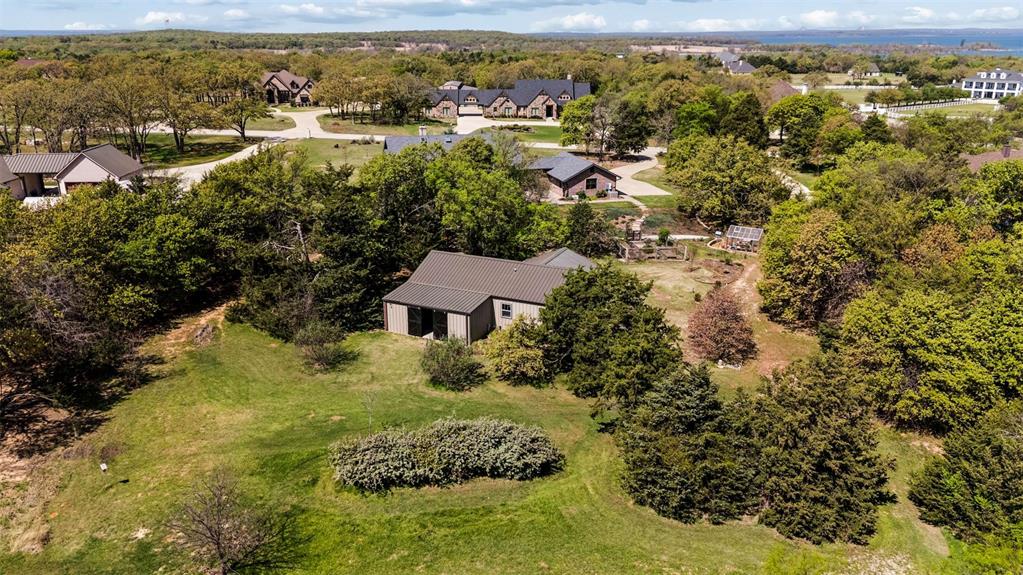 7430 Dawn Avenue Pilot Point, TX 76258 - Photo 39 of 39 an aerial view of residential houses with outdoor space