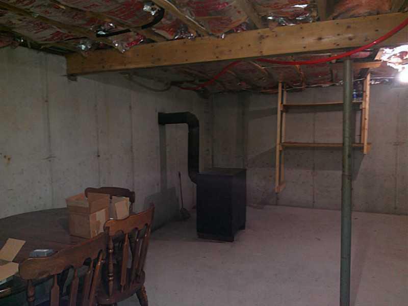 505 Oak Point Road Trenton, ME 04605 - Photo 27 of 29 Other. Basement/woodstove.
