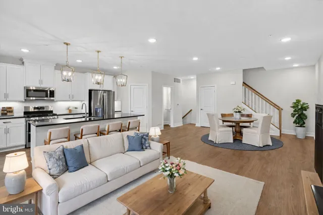 a bedroom with a bed and a potted plant