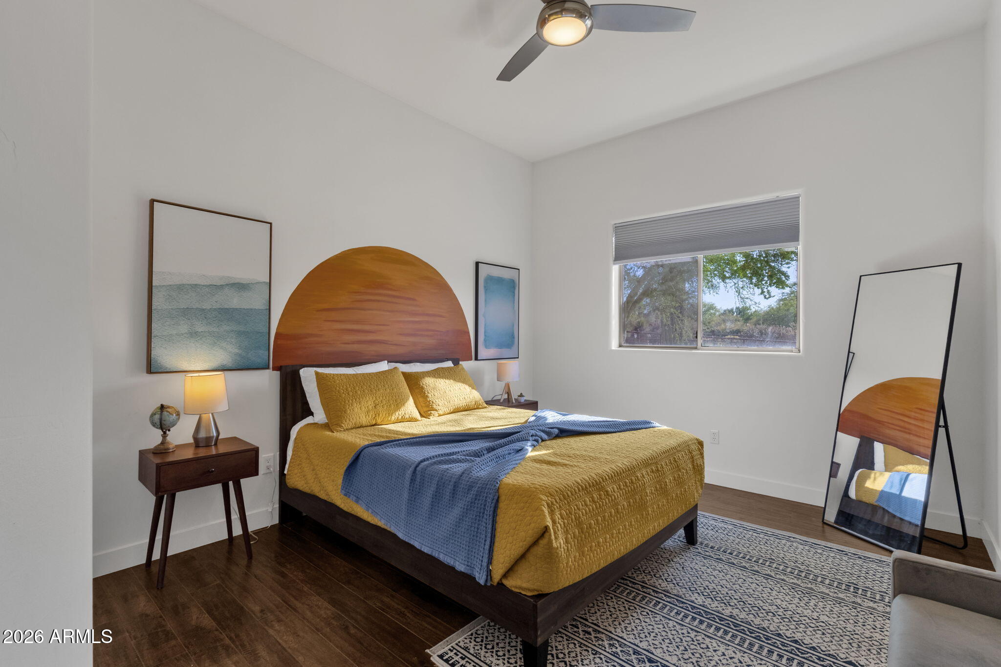 14604 East Peak View Road Scottsdale, AZ 85262 - Photo 18 of 55 a bedroom with a bed and dresser with wooden floor