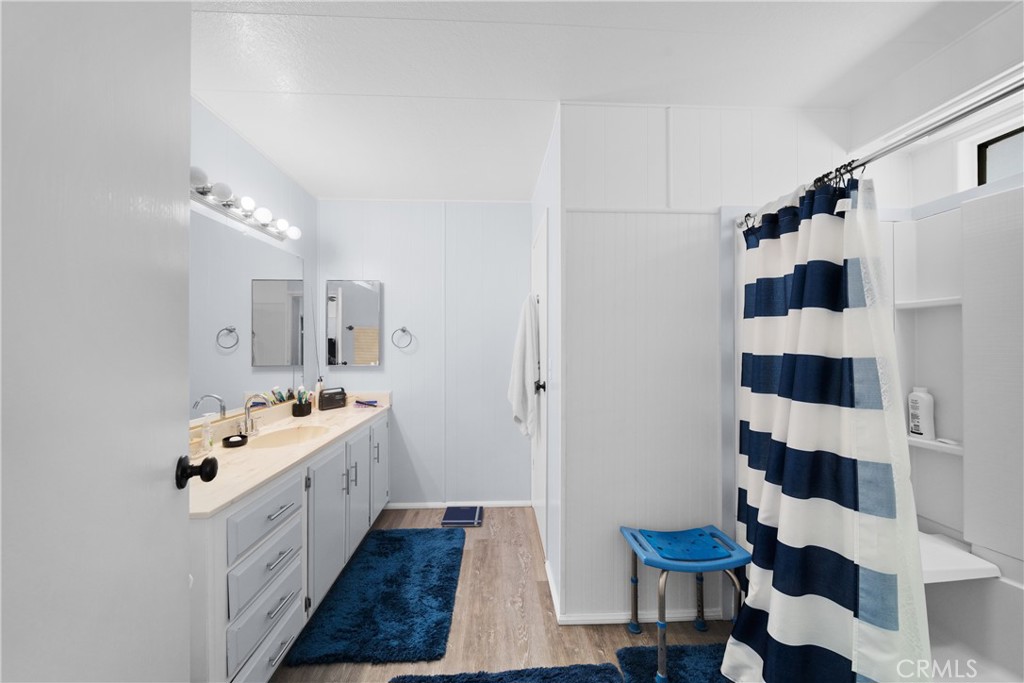 9391 California Avenue, Unit 56 Riverside, CA 92503 - Photo 30 of 45 a large white kitchen with a sink and a refrigerator