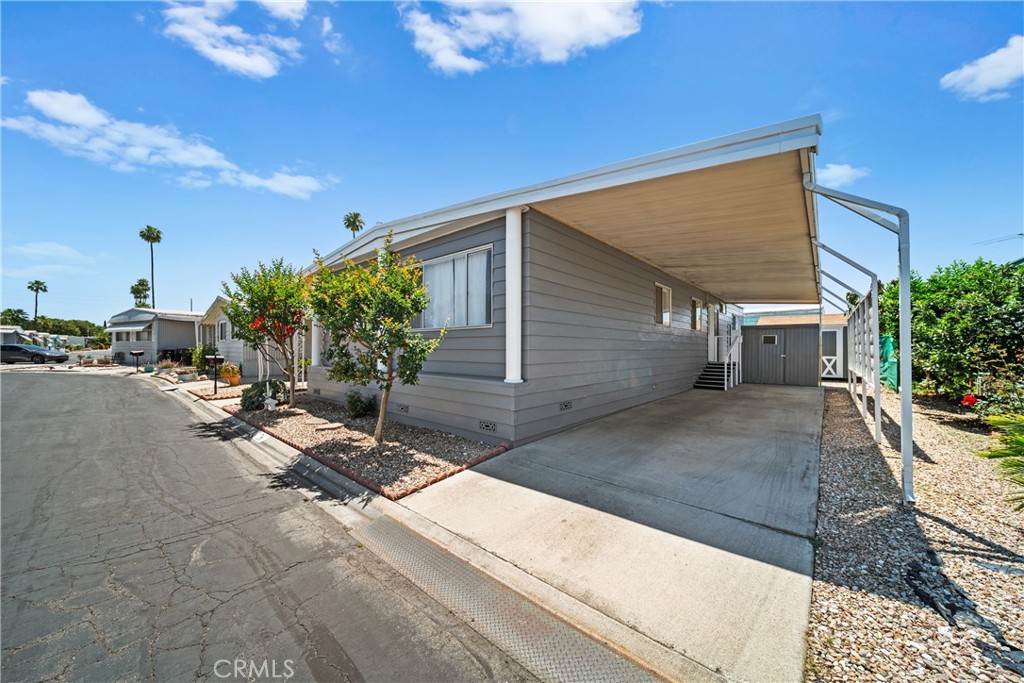9391 California Avenue, Unit 56 Riverside, CA 92503 - Photo 3 of 45 a view of house along with street
