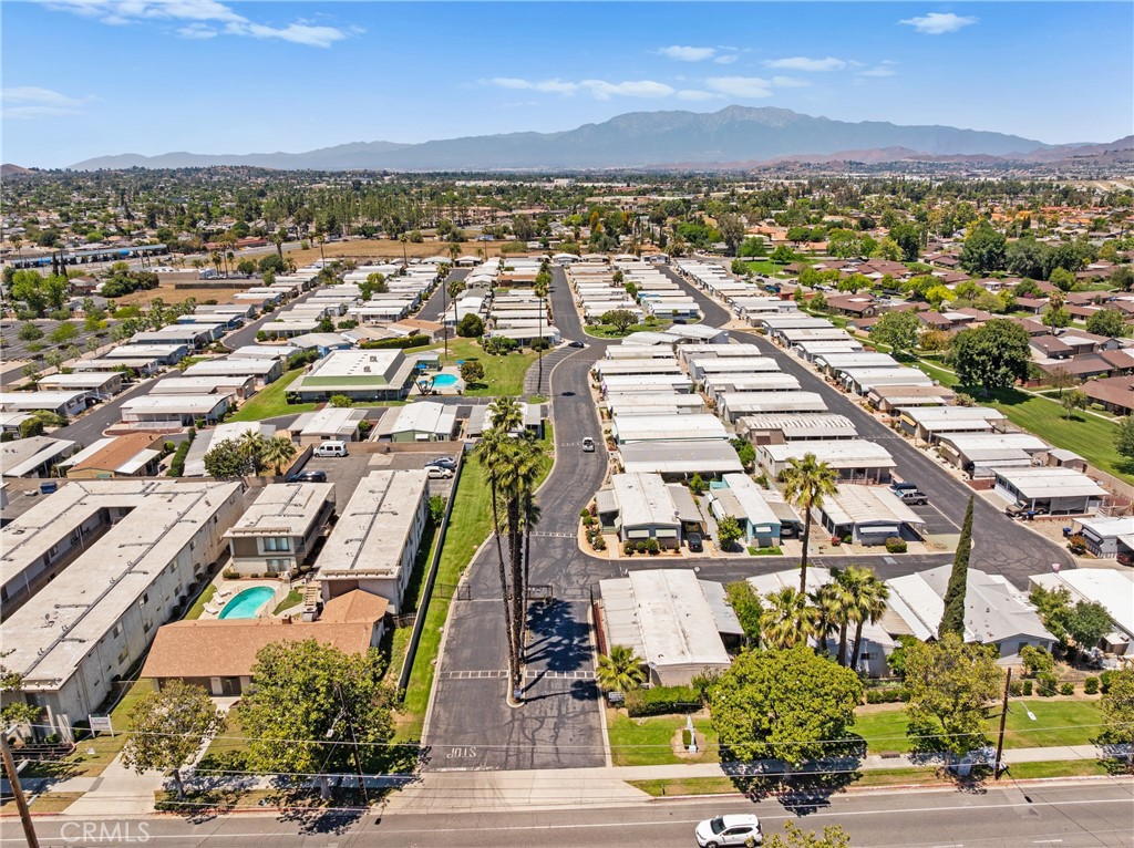 9391 California Avenue, Unit 56 Riverside, CA 92503 - Photo 38 of 45 an aerial view of residential houses with outdoor space