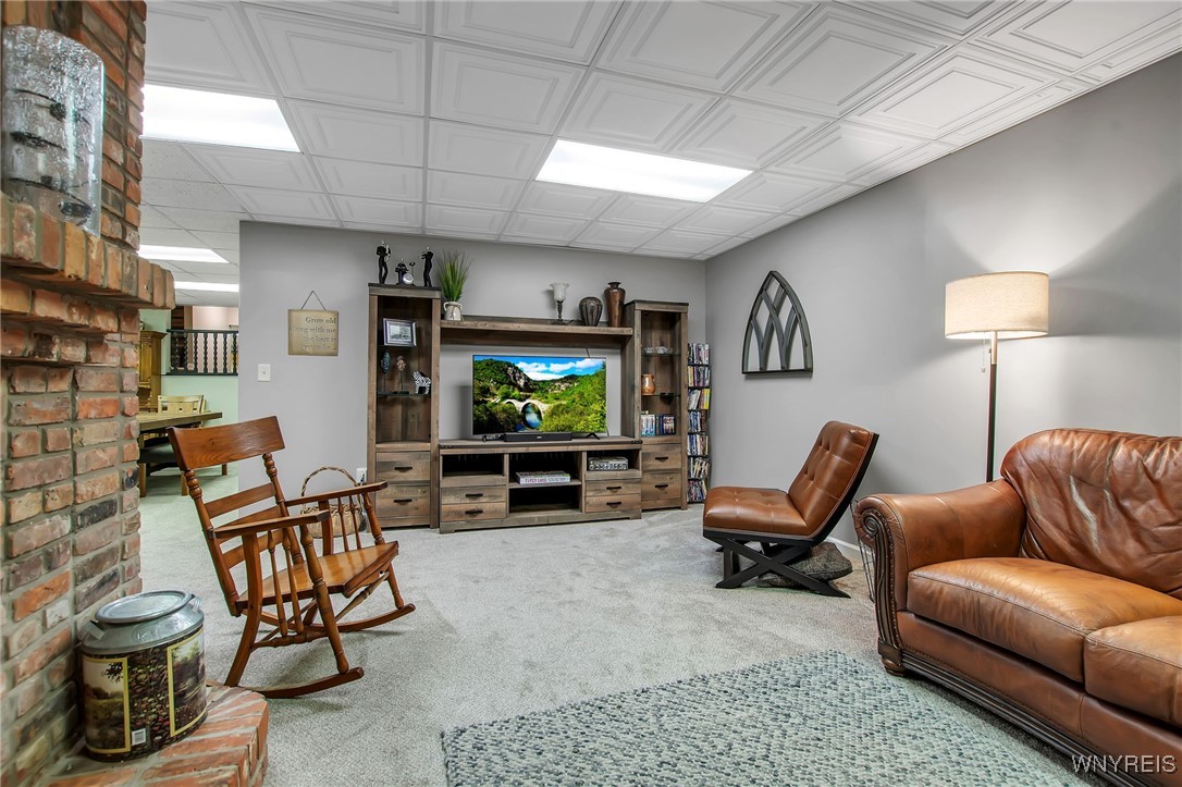 393 Glengrove Road Porter, NY 14174 - Photo 38 of 50 Finished basement TV area