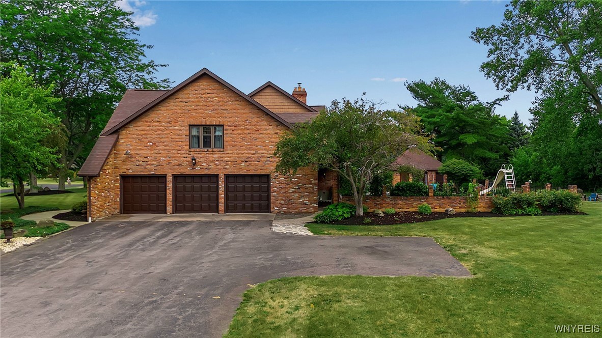 393 Glengrove Road Porter, NY 14174 - Photo 4 of 50 3.5 car garage and extra parking
