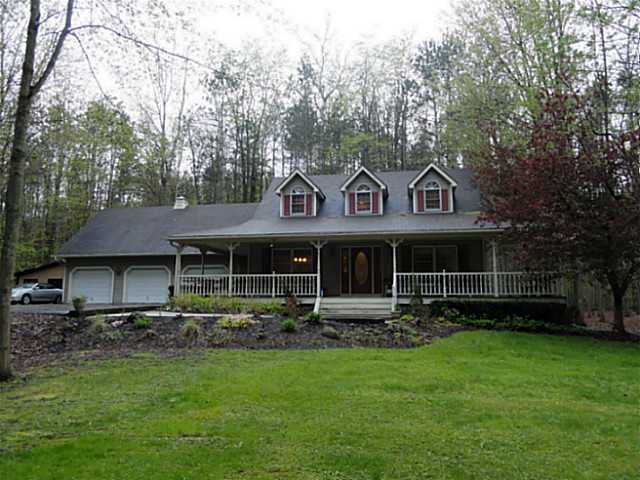 788 Curran Road Manchester, NY 14548 - Photo 1 of 1 Exterior Front. Wooded country setting features th